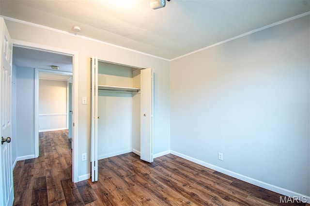 10344 Forest Brook Ln Unit C, Saint Louis, MO 63146 - unfurnished bedroom with dark wood-style floors, a closet, and ornamental molding
