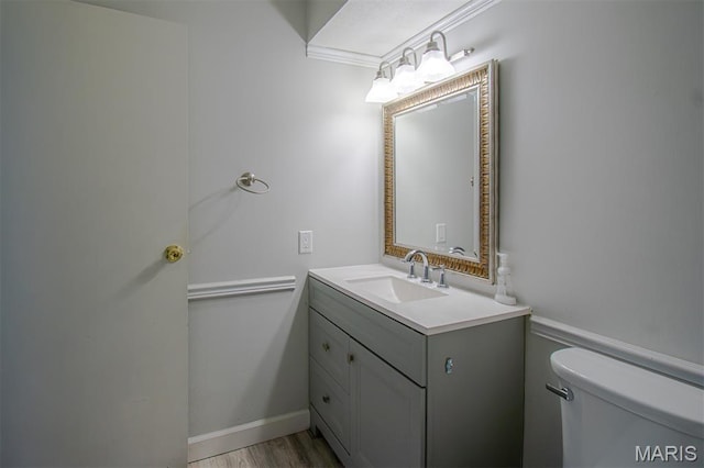 10344 Forest Brook Ln Unit C, Saint Louis, MO 63146 - half bathroom with vanity, wood finished floors, and crown molding