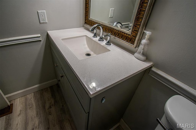 10344 Forest Brook Ln Unit C, Saint Louis, MO 63146 - bathroom featuring vanity and wood finished floors