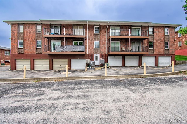 10344 Forest Brook Ln Unit C, Saint Louis, MO 63146 - view of building exterior with an attached garage