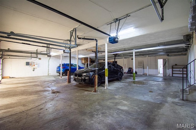 10344 Forest Brook Ln Unit C, Saint Louis, MO 63146 - garage featuring a garage door opener