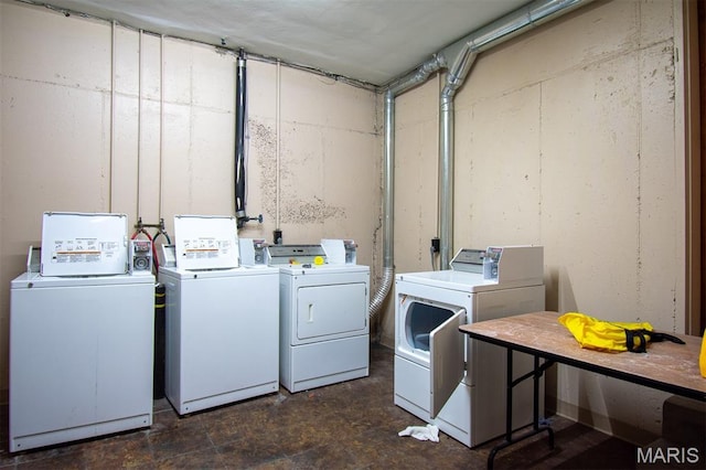 10344 Forest Brook Ln Unit C, Saint Louis, MO 63146 - communal laundry room featuring washer and clothes dryer