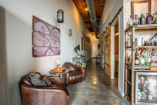 721 17th St Unit 207, Saint Louis, MO 63102 - living area featuring a barn door and finished concrete floors