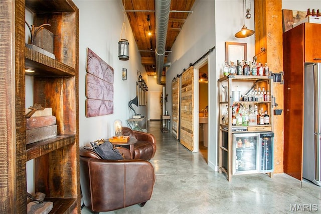 721 17th St Unit 207, Saint Louis, MO 63102 - corridor featuring finished concrete flooring and a barn door