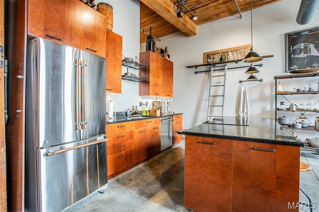 721 17th St Unit 207, Saint Louis, MO 63102 - kitchen featuring appliances with stainless steel finishes, a wood ceiling with exposed beams, finished concrete flooring, a kitchen island, and brown cabinets