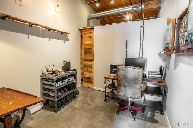 721 17th St Unit 207, Saint Louis, MO 63102 - home office featuring concrete flooring, wood ceiling, and a towering ceiling