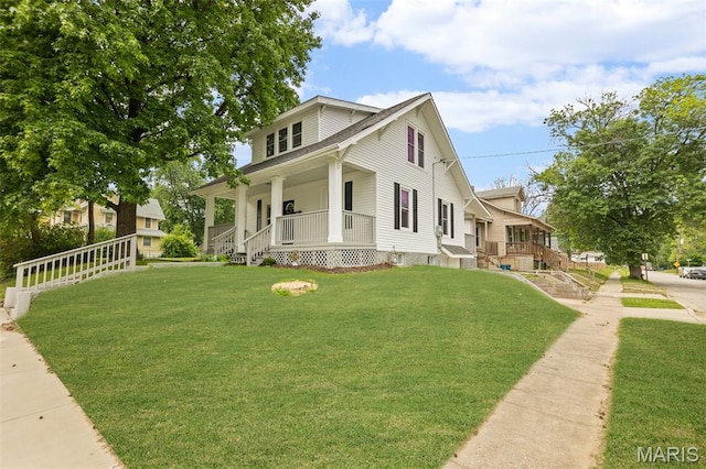 1801 Main St, Alton, IL 62002 - bungalow-style house with covered porch and a front lawn