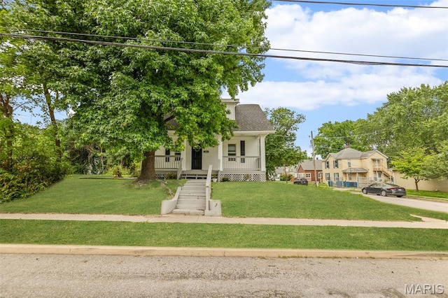 1801 Main St, Alton, IL 62002 - view of front of home featuring a porch and a front lawn