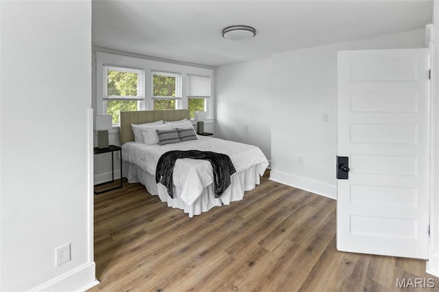 1801 Main St, Alton, IL 62002 - bedroom featuring wood finished floors