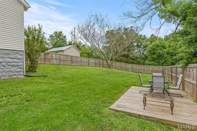 302 Bogy St, De Soto, MO 63020 - fenced backyard featuring a wooden deck