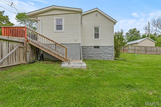 302 Bogy St, De Soto, MO 63020 - rear view of property with stairs