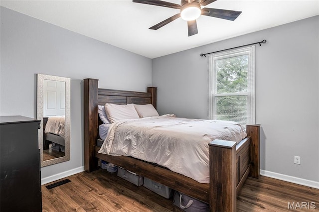 302 Bogy St, De Soto, MO 63020 - bedroom with wood finished floors and ceiling fan