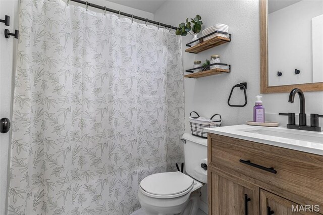 302 Bogy St, De Soto, MO 63020 - full bathroom with vanity and a shower with curtain
