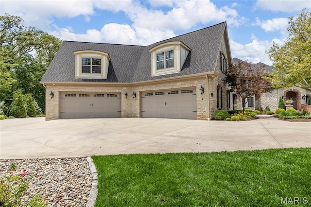701 Crown Pointe Farms, Defiance, MO 63341 - view of front of property with driveway, roof with shingles, stone siding, and a garage