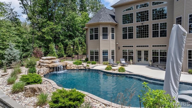 701 Crown Pointe Farms, Defiance, MO 63341 - swimming pool featuring a patio and french doors