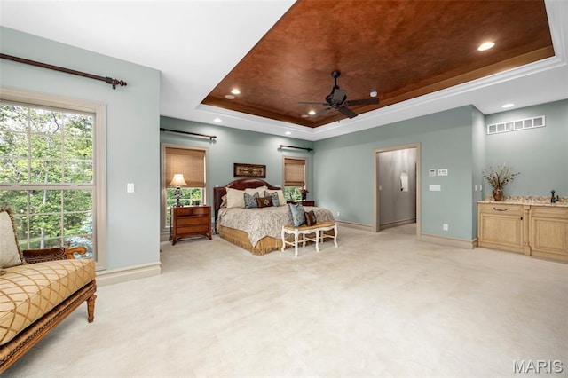 701 Crown Pointe Farms, Defiance, MO 63341 - bedroom featuring a tray ceiling, light carpet, and recessed lighting