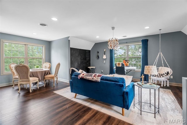 701 Crown Pointe Farms, Defiance, MO 63341 - living area featuring wood finished floors, lofted ceiling, a chandelier, and recessed lighting