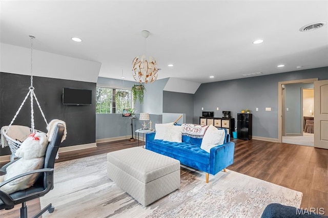 701 Crown Pointe Farms, Defiance, MO 63341 - living area featuring wood finished floors, a chandelier, and recessed lighting