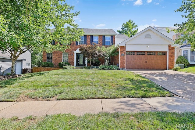 3038 Woodbridge Creek Dr, Saint Louis, MO 63129 - colonial inspired home with concrete driveway, an attached garage, a front yard, and brick siding