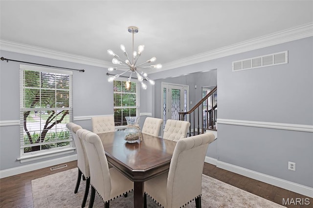 3038 Woodbridge Creek Dr, Saint Louis, MO 63129 - dining room with a chandelier, ornamental molding, wood finished floors, and stairway