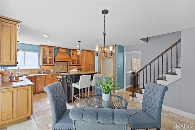 3038 Woodbridge Creek Dr, Saint Louis, MO 63129 - dining area with a chandelier, stairs, and recessed lighting
