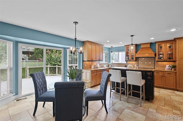 3038 Woodbridge Creek Dr, Saint Louis, MO 63129 - dining room with a chandelier and recessed lighting