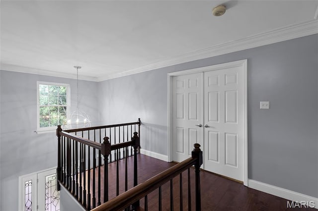 3038 Woodbridge Creek Dr, Saint Louis, MO 63129 - hall featuring an upstairs landing, a chandelier, dark wood finished floors, and ornamental molding
