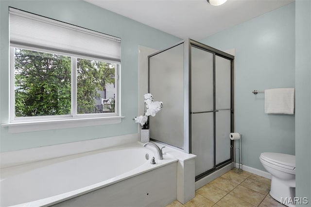 3038 Woodbridge Creek Dr, Saint Louis, MO 63129 - full bathroom with plenty of natural light, a shower stall, a garden tub, and tile patterned floors