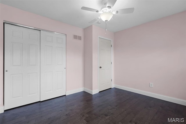 3038 Woodbridge Creek Dr, Saint Louis, MO 63129 - unfurnished bedroom with a closet, dark wood finished floors, and ceiling fan