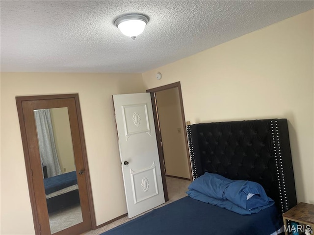 128 Myers St, Licking, MO 65542 - carpeted bedroom with a textured ceiling