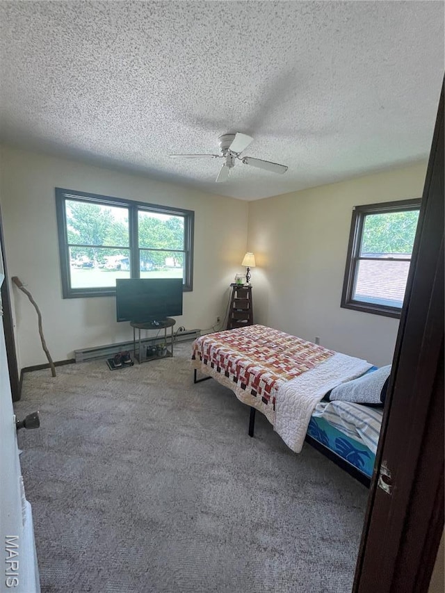 128 Myers St, Licking, MO 65542 - carpeted bedroom featuring a textured ceiling and a ceiling fan