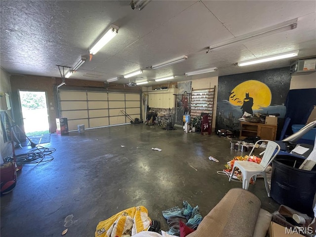 128 Myers St, Licking, MO 65542 - garage featuring a garage door opener