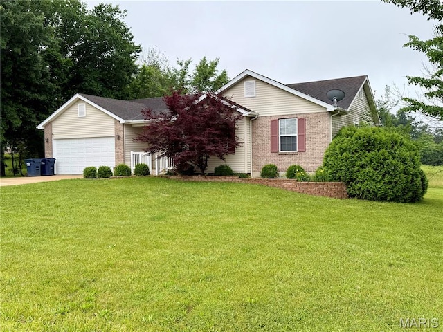 51 Tower St, Moscow Mills, MO 63362 - view of front of home with brick siding, an attached garage, a front lawn, and driveway