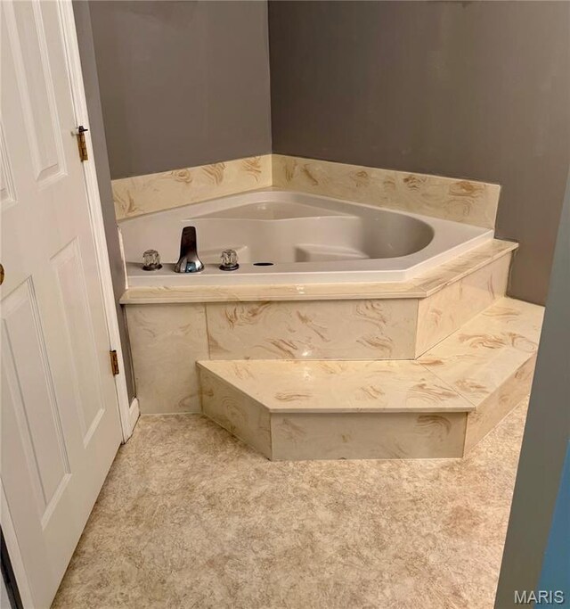 51 Tower St, Moscow Mills, MO 63362 - full bathroom with a garden tub
