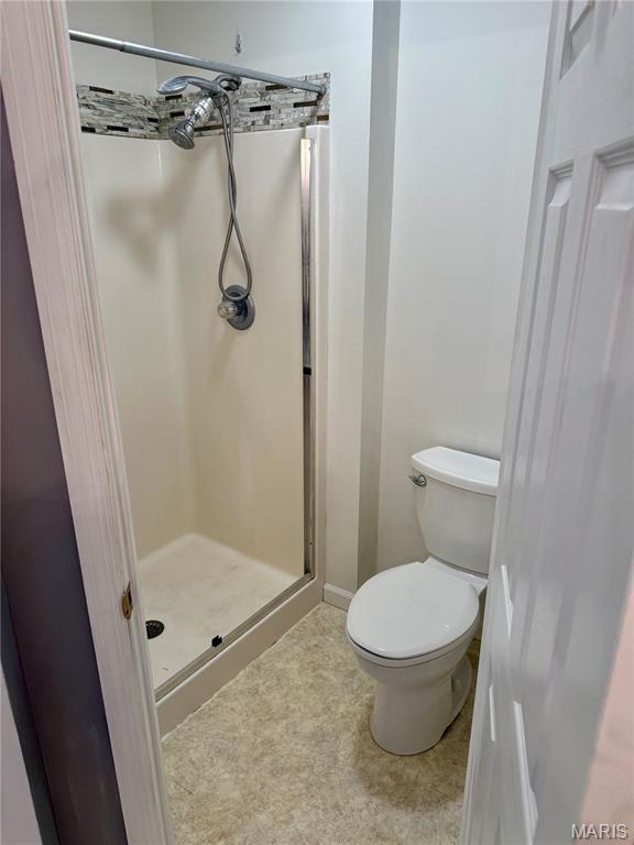 51 Tower St, Moscow Mills, MO 63362 - full bath with a stall shower and toilet