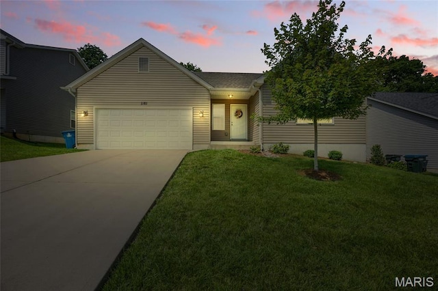 1161 Foxwood Estates Dr, Arnold, MO 63010 - view of front of house featuring concrete driveway, an attached garage, and a yard