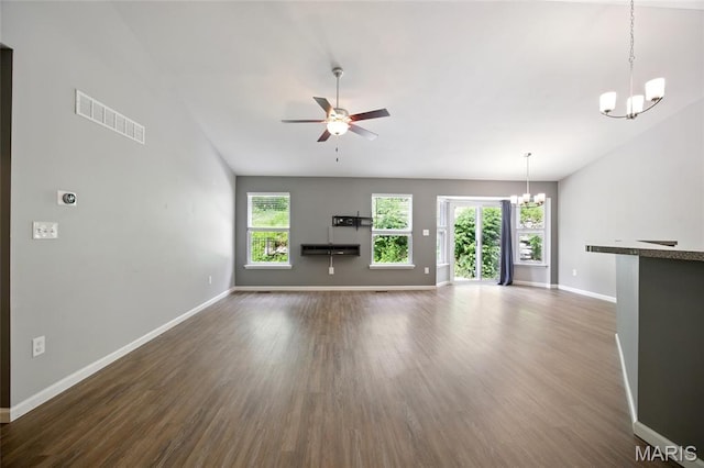 1161 Foxwood Estates Dr, Arnold, MO 63010 - unfurnished living room with a chandelier, dark wood-type flooring, ceiling fan, and lofted ceiling