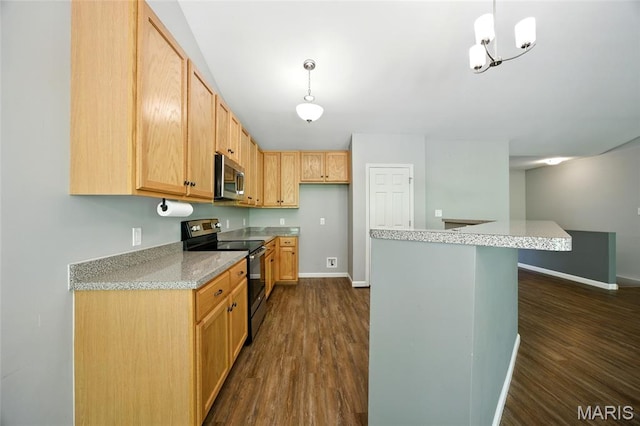 1161 Foxwood Estates Dr, Arnold, MO 63010 - kitchen with electric range, stainless steel microwave, dark wood-type flooring, hanging light fixtures, and a kitchen island