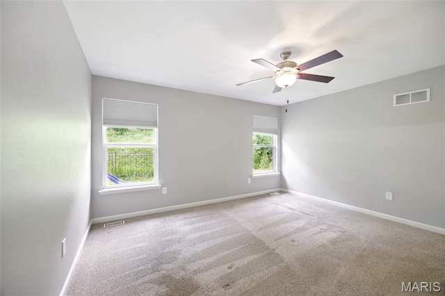 1161 Foxwood Estates Dr, Arnold, MO 63010 - spare room featuring plenty of natural light, carpet, and a ceiling fan