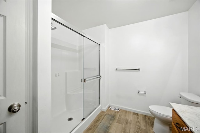 1161 Foxwood Estates Dr, Arnold, MO 63010 - full bath featuring wood finished floors, a shower stall, and vanity