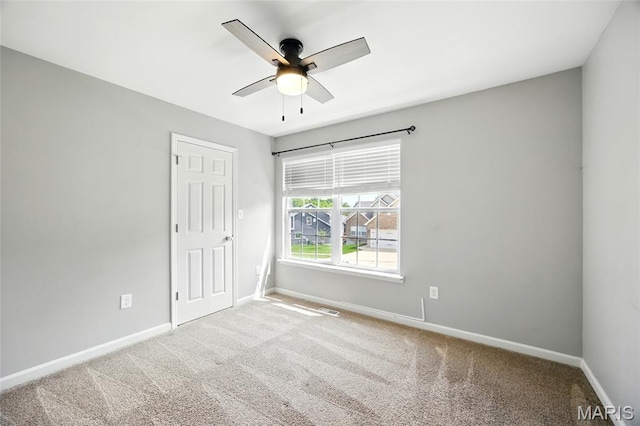 1161 Foxwood Estates Dr, Arnold, MO 63010 - spare room with ceiling fan and carpet floors