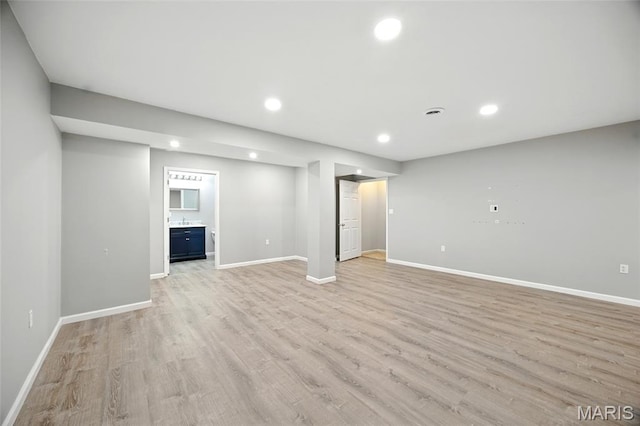 1161 Foxwood Estates Dr, Arnold, MO 63010 - basement featuring recessed lighting and light wood finished floors
