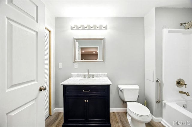 1161 Foxwood Estates Dr, Arnold, MO 63010 - full bath featuring wood finished floors, vanity, and tub / shower combination