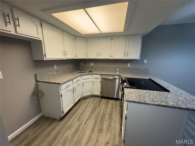 1420 Heritage Lndg Unit 107, Saint Charles, MO 63303 - kitchen featuring dishwasher, light wood-style flooring, a peninsula, and white cabinets
