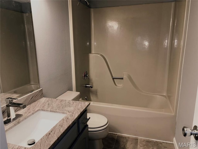 1420 Heritage Lndg Unit 107, Saint Charles, MO 63303 - full bathroom with vanity, shower / tub combination, and a textured wall