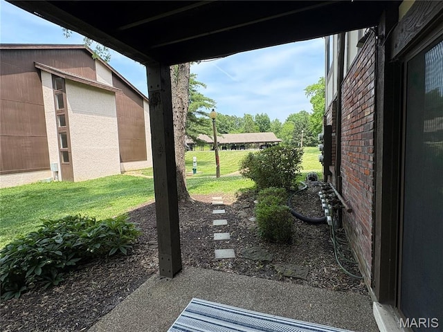 1420 Heritage Lndg Unit 107, Saint Charles, MO 63303 - view of green lawn