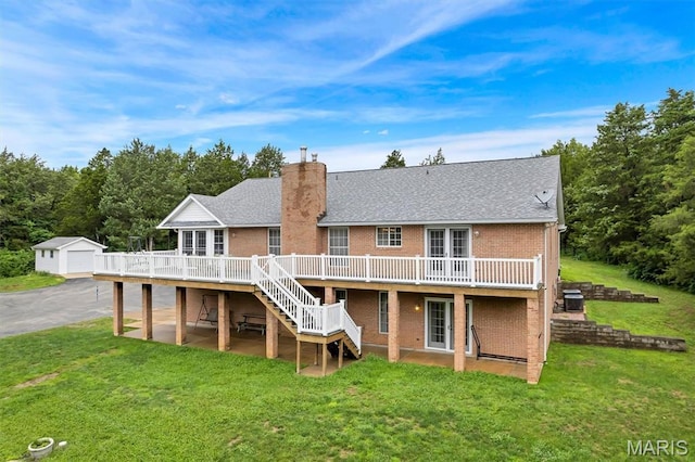 2518 Nike Base Rd, Catawissa, MO 63015 - back of property with a deck, stairs, brick siding, a chimney, and a yard