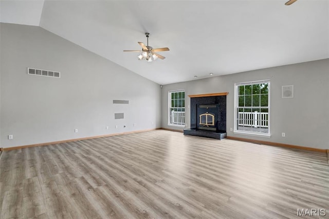 2518 Nike Base Rd, Catawissa, MO 63015 - unfurnished living room with ceiling fan, plenty of natural light, lofted ceiling, and wood finished floors