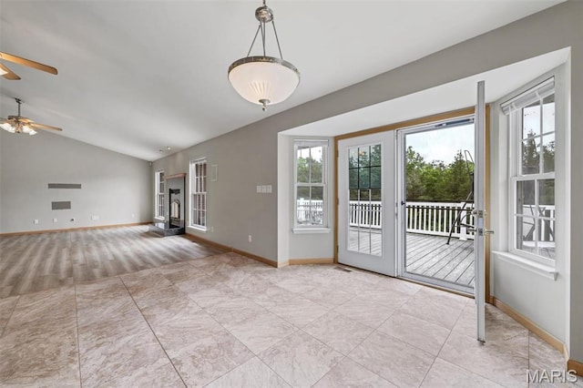2518 Nike Base Rd, Catawissa, MO 63015 - unfurnished living room featuring a ceiling fan, lofted ceiling, tile patterned floors, and carpet floors