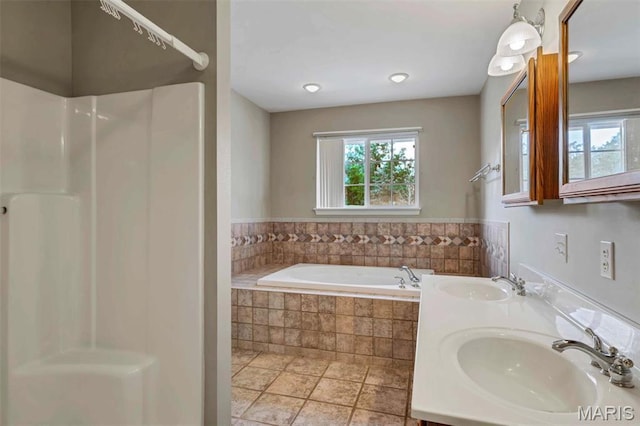 2518 Nike Base Rd, Catawissa, MO 63015 - bathroom with plenty of natural light, a bath, double vanity, and a shower